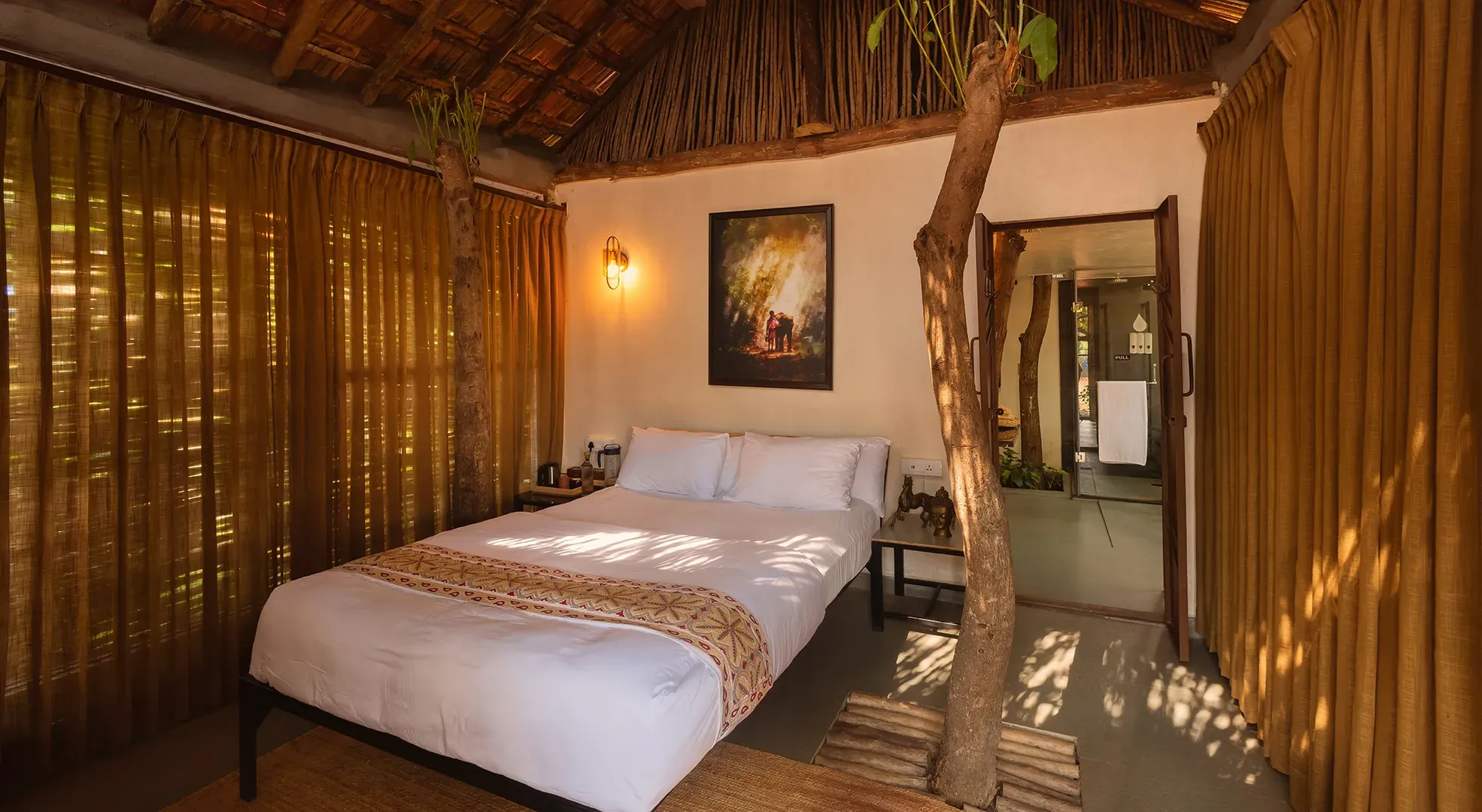 A garden cottage built among living trees at Orchid Tree near Bangalore